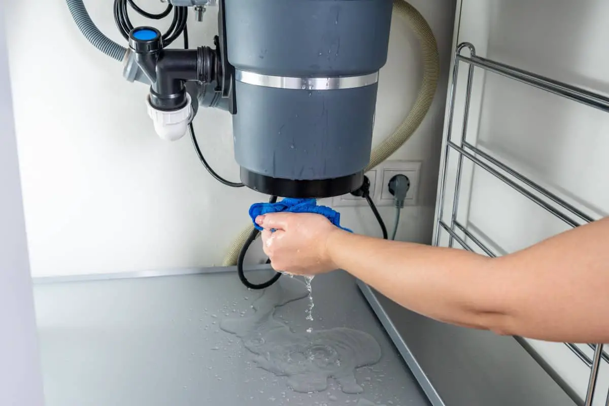 Can I Use My Dishwasher if My Garbage Disposal is Leaking? DisposalXT